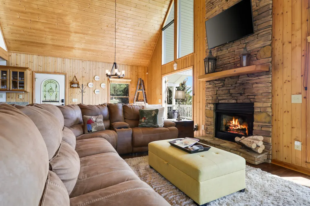 Living room with the gas fireplace lit